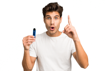 Young caucasian man holding an electronic cigarette isolated having an idea, inspiration concept.