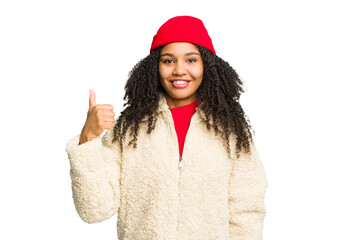 Young african american woman wearing winter clothes isolated smiling and raising thumb up