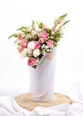 bouquet of flowers in vase isolated on white background 