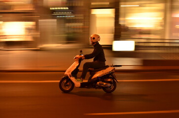 Scooter in the City at night Frankfurt lon exposure