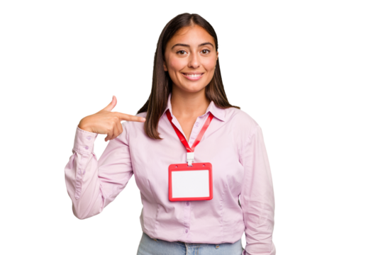 Young caucasian woman with a badge isolated person pointing by hand to a shirt copy space, proud and confident
