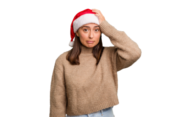 Young caucasian woman celebrating christmas wearing a santa hat isolated being shocked, she has remembered important meeting.