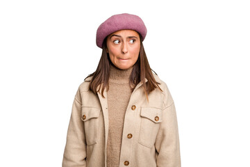Fototapeta premium Young caucasian woman wearing winter jacket isolated confused, feels doubtful and unsure.