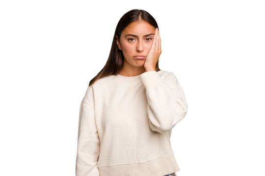 Young cute caucasian woman isolated who feels sad and pensive, looking at copy space.