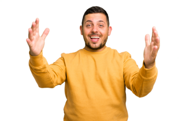 Young caucasian man isolated celebrating a victory or success, he is surprised and shocked.