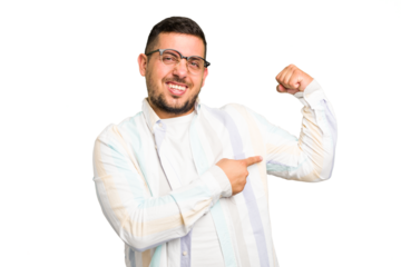 Young caucasian man isolated showing strength gesture with arms, symbol of feminine power