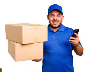 Fototapeta na wymiar Delivery caucasian man delivering packages and using his mobile phone isolated
