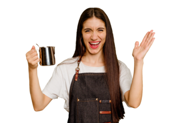 Young barista caucasian woman isolated receiving a pleasant surprise, excited and raising hands.