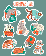 Funny Christmas and New Year cats stickers set. Cute cats with garland, giftboxes , sweaters. Collection of naughty pets for winter seasonal celebration and greetings - 544079705