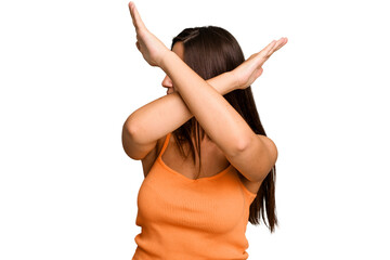 Obraz premium Young caucasian cute woman isolated keeping two arms crossed, denial concept.