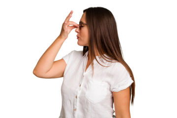 Young caucasian cute woman isolated having a head ache, touching front of the face.