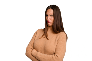 Young caucasian cute woman isolated frowning face in displeasure, keeps arms folded.