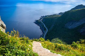 panorama of lofoten islands in norway from the famous reinebringen summit; challenging stair...
