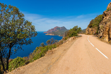 Coastal road in the west of Corsica near the Gulf of Griolata, France