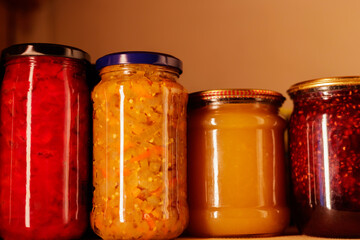 Wide banner with homemade preserved food. Shelves for storing canned food. Horizontal format