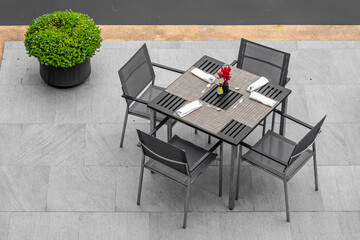 The set of table be prepared for meal with fork and spoon , top view style. 