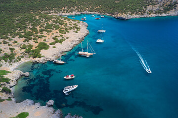 Aerial view of blue sea lagoon and yachts along the mediterranean coast. Landscape of turkish...