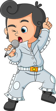The boy is singing very good with a elvis costume that he wears