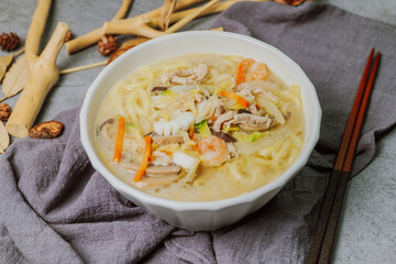 Korean style spicy white noodle soup with seafood 'hayan jjamppong'