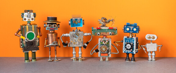 Six steampunk robots on an orange brown background. Metal copper silver texture characters lined up in a row. A group of robots of different height, color and material - 544111390