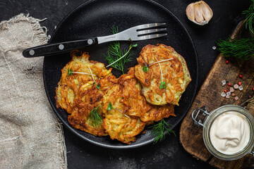 Potato pancakes in a bowl. Draniki.