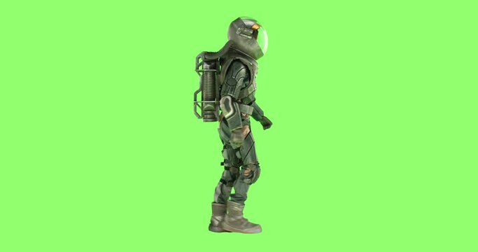 CHROMA KEY Side view of male astronaut wearing a spacesuit walking against green screen