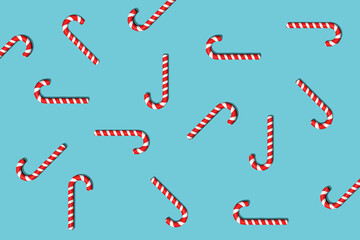 Seamless pattern of red striped sweetmeats. Hard candy, candy cane, lollipop. Background for fabric, wrapping paper, textile, print, wallpaper.