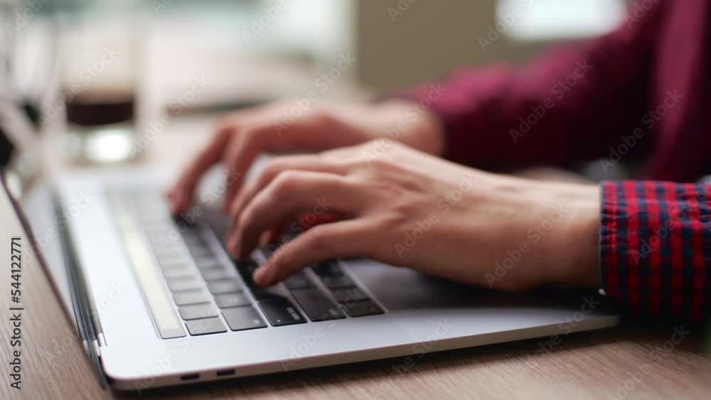 Wall mural close up of freelancer's developer hands typing program code on laptop keyboard in coworking. busine