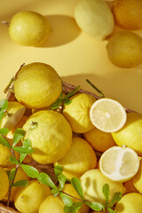 Japanese Yuzu fruit or lime fruit on yellow background. The extract from yuzu fruit or lime is very...