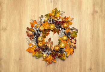 Dried floral wreath on wooden background. Autumn home decor. Thanksgiving Concept