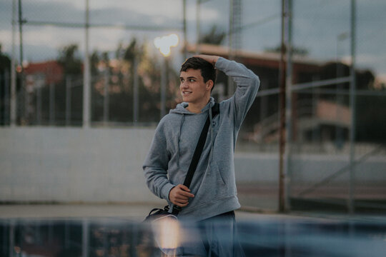 Vertical shot of player portrait coming out of training with blurred background.