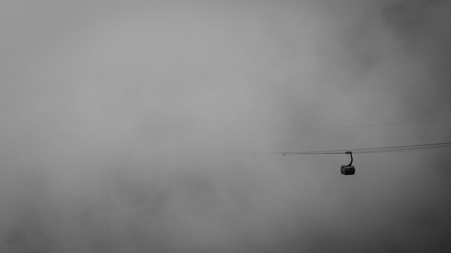 Cable car disappearing in the fog