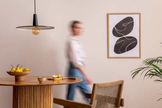 Interior Design Of Domestic Dining Room Space With Two Mock Up Poster Frames, Round Table, Chair, Pedant Lamp, Decoration And Woman In Jeans. Minimalist Home Decor. Template.