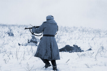 Members of a history club wear historical Soviet uniforms in action during a WWII reenactment 