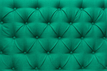 Green leather upholstery sofa pattern button design furniture style decor texture background decoration vintage abstract
