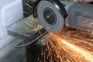 Katana sword rasp grindering. Blade fixed in the steel clamp.