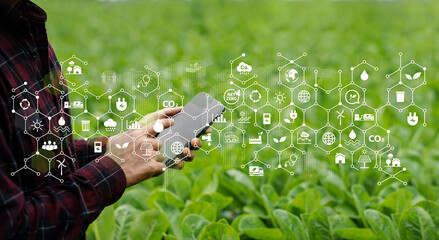 Farmer businessman with ESG icon concept on mobile screen. Environment, society, governance,...