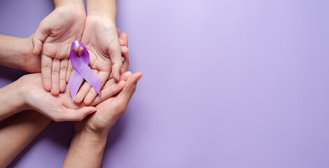 hands holding purple ribbons, Alzheimer's disease, Pancreatic cancer, Epilepsy awareness, world...