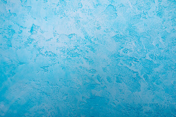 Blue background, decorative stucco texture