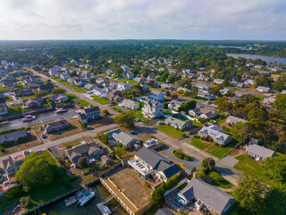 Historic waterfront house aerial view at Bass River mouth near West Dennis Beach in summer in town of Dennis, Massachusetts MA, USA. 