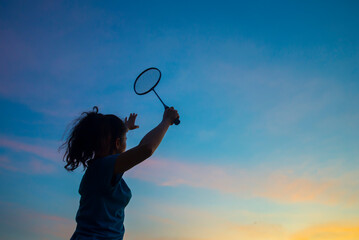 badminton player gestures outdoor silhouette