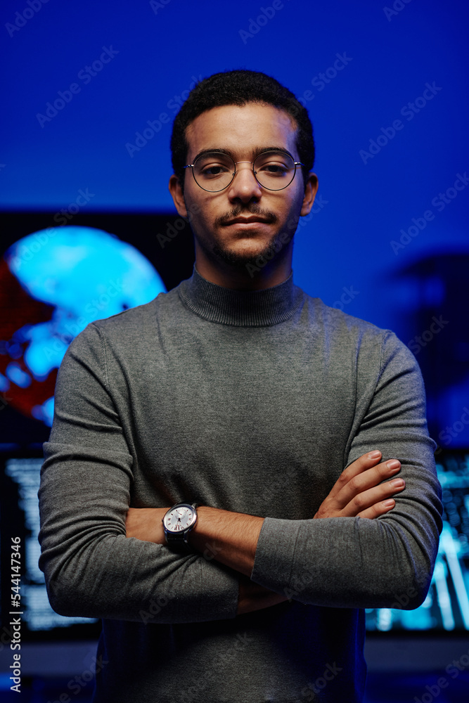 Poster Young confident software developer or IT support manager in grey casual pullover crossing arms by chest while standing in front of camera
