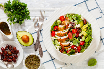 Mediterranean grilled Chicken Salad in white bowl