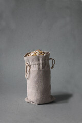 bag of oatmeal isolated on gray background