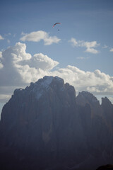 Paraglider over the mountains. Dolomiti, Italy.