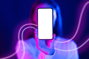 Unrecognizable woman hiding behind cell phone with blank screen, mockup - obrazy, fototapety, plakaty