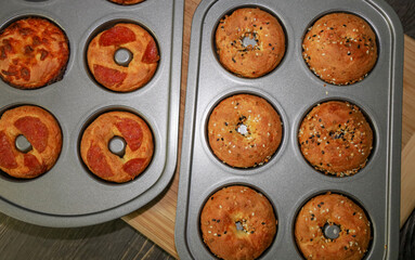 Keto bagels just out of the oven. Ketogenic bagels with different bagels.