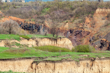 Soil erosion, sliding, and caving. Inside the landslide is rock. Consequences of underground mining - ground failure.