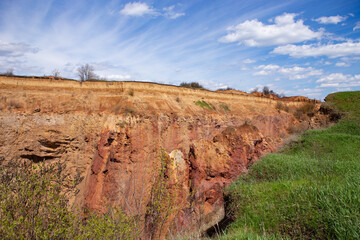 Soil erosion, sliding, and caving. Inside the landslide is rock. Consequences of underground mining - ground failure.