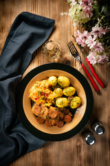 Stewed turkey meat with chorizo sausage.